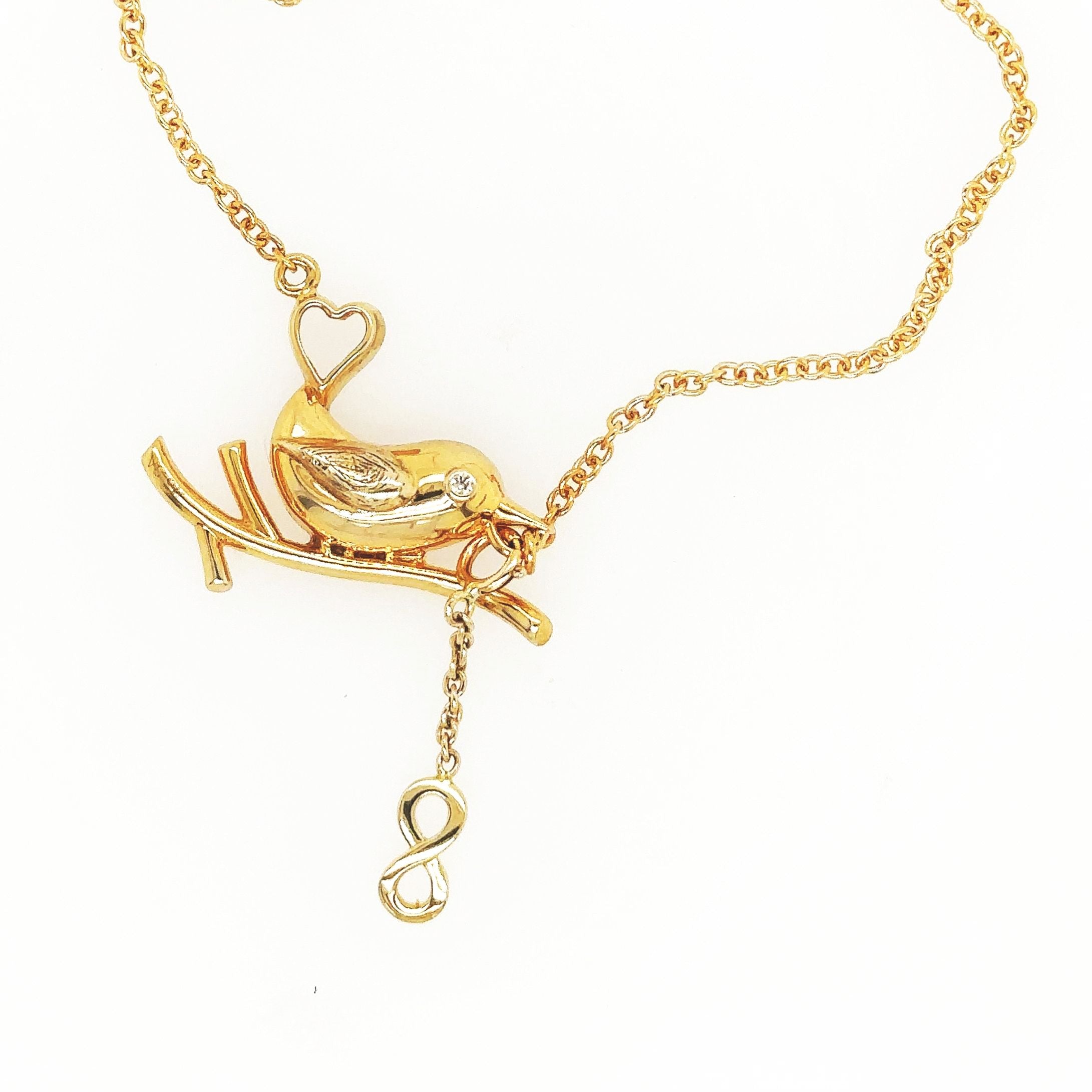 White gold online bird necklace